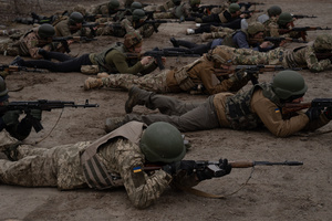 Trainees are seen in a shooting position in a training organised by the third separate assault brigade in Kyiv region. Ukraine is facing a shortage of ammunition and military personnel. Aside from a tougher mobilisation law is under way, some brigades in the country have chosen a more encouraging approach to recruit people without previous military experience to join the army. The third separate assault brigade offers a 7-day free training course advertises to allow participants to have a taste of military training, enabling them to find their place in the army according to their skills and ability. Participants here are as young as 18 years old. 

When the war between Ukraine and Russia grind on for the second year mark, Ukraine president Volodymyr Zelensky revealed in last December the military wants to mobilise an extra 500,000 people.