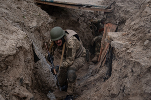 A trainee was seen passing the trenches in a training simulating an evacuation mission in the trench organised by the third separate assault brigade in Kyiv region. Ukraine is facing a shortage of ammunition and military personnel. Aside from a tougher mobilisation law is under way, some brigades in the country have chosen a more encouraging approach to recruit people without previous military experience to join the army. The third separate assault brigade offers a 7-day free training course advertises to allow participants to have a taste of military training, enabling them to find their place in the army according to their skills and ability. Participants here are as young as 18 years old. 

When the war between Ukraine and Russia grind on for the second year mark, Ukraine president Volodymyr Zelensky revealed in last December the military wants to mobilise an extra 500,000 people.