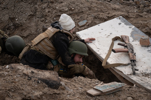A trainee is seen carrying a potentially injured soldier in a training simulating an evacuation mission in the trench organised by the third separate assault brigade in Kyiv region. Ukraine is facing a shortage of ammunition and military personnel. Aside from a tougher mobilisation law is under way, some brigades in the country have chosen a more encouraging approach to recruit people without previous military experience to join the army. The third separate assault brigade offers a 7-day free training course advertises to allow participants to have a taste of military training, enabling them to find their place in the army according to their skills and ability. Participants here are as young as 18 years old. 

When the war between Ukraine and Russia grind on for the second year mark, Ukraine president Volodymyr Zelensky revealed in last December the military wants to mobilise an extra 500,000 people.