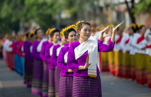 Thai performers wearing traditional costumes perform Thai Lanna dance during the 728th anniversary celebrations of Chiang Mai city. The city of Chiang Mai was founded by The three kings: King Mangrai, King Ngam Mueang and King Ram Khamhaeng on 12 April 1296.
