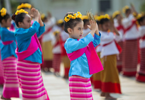 A kid wearing traditional costumes performs Thai Lanna dance during the 728th anniversary celebrations of Chiang Mai city. The city of Chiang Mai was founded by The three kings: King Mangrai, King Ngam Mueang and King Ram Khamhaeng on 12 April 1296.