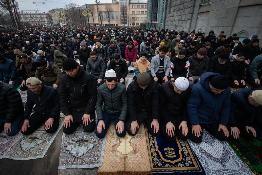Muslims offer prayers near the St. Petersburg Cathedral Mosque on Kronversky Prospekt during the celebration of Eid Al-Fitr (Uraza Bayram), which is celebrated to mark the end of the month of Ramadan.