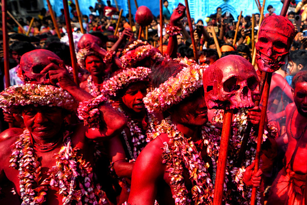 (EDITORS NOTE: Image contain graphic content) 
Hindu devotees are seen dancing with human skull and sticks during the Gajan Festival. Gajan is a Hindu festival celebrated mostly in the rural part of West Bengal. The festival is related to Lord Shiva and as per Mythology on the last day of Bengali Calendar (Middle of April) devotees used to worship dead bodies to satisfy Lord Shiva for better rain and harvest. The central theme of this festival is deriving satisfaction through non-sexual pain, devotion and sacrifice.