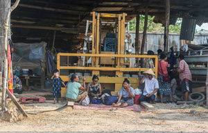 War refugees who flee from the Myawaddy war seen sitting in front of a vehicle in Mae Sot. On April 12, Karen KNLA and PDF forces raided the army's 275th military garrison in Myawady town, prompting more than 100 soldiers to attempt to flee to Thailand across Friendship Bridge No. 2. The KNLA/PDF joint forces subsequently attacked these soldiers on the night of April 19th. According to residents, the military council's air response included no fewer than 40 bombs being dropped. As a result of the fighting, approximately 2,000 people fled to Mae Sot, Thailand, across the Moei (Thaung Yin) River.
