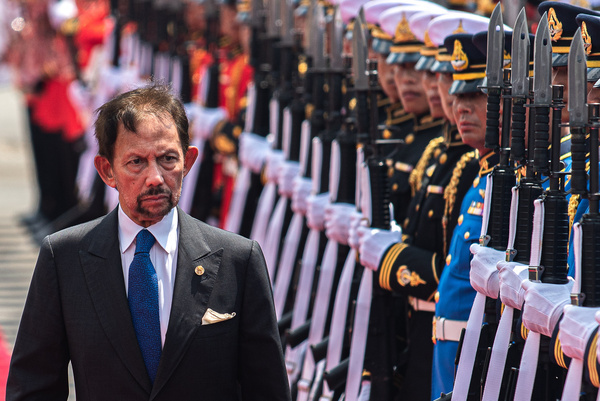 Sultan of Brunei Hassanal Bolkiah, inspects the guard of honor during a welcoming ceremony at Government House. Sultan of Brunei Hassanal Bolkiah and Prince Abdul Mateen are on a two-days official visit to Thailand that aim to strengthen the two nations especially in investment, halal industry, and tourism.
