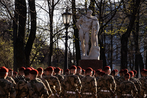 Russian employees of the Ministry of Emergency Situations after the rehearsal of the Victory Parade on May 9 on Palace Square walk through the Alexander Garden near the statue of Hercules of Farnese.
