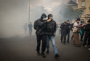 Protesters seen wearing swimming goggles and gas masks to protect themselves from the anti-riot material during the labour day demonstrations. A day full of clashes between the black-block, anarchists and anti-capitalists groups, with the police became the usual on the celebration of the 1st of may the Labour day in Paris, complaining about president Macron's government and his political and social law makings.