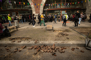 A pavement is seen destroyed by protester with the intent to use the broken bricks to throw at police during the Labour day demonstrations. A day full of clashes between the black-block, anarchists and anti-capitalists groups, with the police became the usual on the celebration of the 1st of may the Labour day in Paris, complaining about president Macron's government and his political and social law makings.