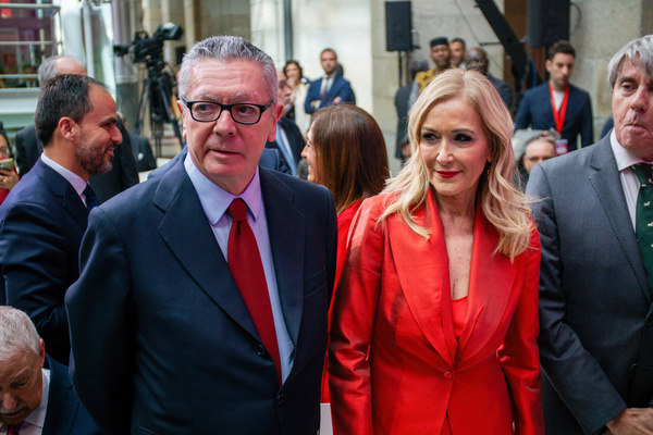 The former mayor of Madrid Alberto Ruiz Gallardon (L) with the former president of the community of Madrid, Cristina Cifuentes (R) seen during the civic-military event on the occasion of the Community of Madrid Day. The president of the Community of Madrid, Isabel Díaz Ayuso, presided over the civic-military event on the occasion of Community of Madrid Day in Madrid's Puerta del Sol. The civic-military event was presided over on the occasion of the celebrations of the May 2 in Madrid that includes a military parade, rendering of regulatory honors, a review of the force and a tribute ceremony to those who gave their lives for Spain.
