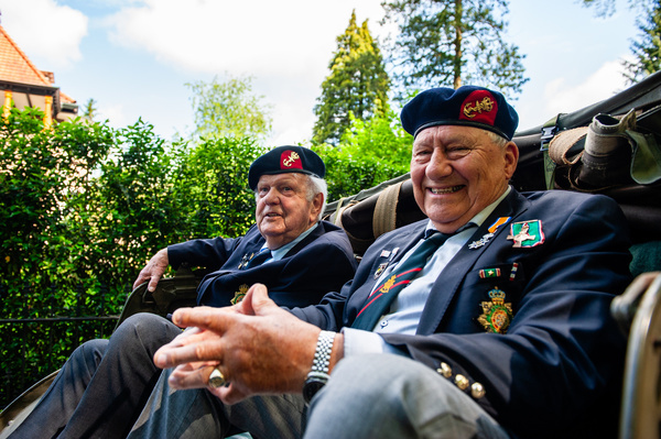 Two war veterans are seen waiting in one of the military cars. The Liberation Day Parade, (Bevrijdingsdefilé' in Dutch) brings together veterans and their current-day military successors to pay tribute to all those who gave their lives during WWII and to the international military cooperation. At the front of the parade were twelve British veterans who fought for Dutch freedom in the Second World War.