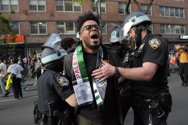Members of the New York City Police Department arrest a pro-Palestine demonstrator during a march. Pro-Palestine demonstrators marched in Manhattan, New York City condemning the Israel Defense Forces' military operations in Gaza. Demonstrators marched to the Fashion Institute of Technology where some students and protesters have been holding a sit-in protest, forming a "Gaza Solidarity Encampment" outside the campus museum. The encampment was inspired by a similar encampment that began at Columbia University last month, which was dismantled by the New York City Police Department last week. The march took place after the IDF launched strikes on the eastern section of the southern city of Rafah in Gaza. The IDF also captured a border crossing in Rafah between Gaza and Egypt. Israeli Prime Minister Benjamin Netanyahu said the IDF will launch an invasion of Rafah. More than half of Gaza's 2.3 million population are sheltered in the city living in tents and United Nations' shelters. Since the Israel-Hamas war started on October 7, 2023, Gaza's health ministry said more than 34,000 people have been killed in Gaza, a territory ruled by Hamas. The death toll does not differentiate between civilians and combatants.