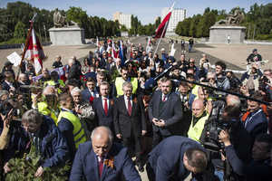 Russia's Ambassador to Poland, Sergey Andreev (middle) lays a wreath at the monument at the cemetery to Red Army soldiers. On Russia's "Victory Day" in Warsaw Russia's Ambassador to Poland, Sergey Andreev and his delegation laid a wreath at the monument at the cemetery to Red Army soldiers who died during World War II. During the ceremony Ukrainian activists tried to disturb the event. May 9th, known as "Victory Day" in Russia, is a holiday commemorating the Soviet victory over Nazi Germany in 1945.