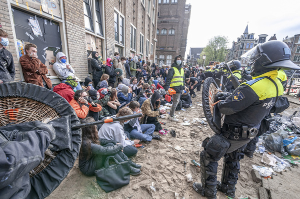 Students detained on the University of Amsterdam campus, during the occupation. Students and supporters occupy the University of Amsterdam, in solidarity with the people of Palestine. They also had a list of demands for those that govern the university and they accuse them of genocide in their support of the Israel. The climate action group ‘Extinction Rebellion’ also participated. The barricades were later dismantled in a show of force by the police and bulldozed into a nearby canal. Protests also took place at the University of Utrecht, also in The Netherlands. Meanwhile the death toll in Gaza continues to rise. Killed: at least 34,904, including 14,500 children. More than 78,514 people injured and 8,000 named victims unaccounted for. The Occupied West Bank. Killed 498 and including more than 124 children and more than 4,950 injured since October 7th 2023. Figures from the Palestine Ministry of Health.