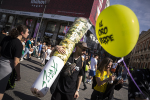 A protester holds a large inflatable joint, during a demonstration through the streets of Madrid, commemorating the World Marijuana March. Since 1999, every first Saturday in May the World Marijuana day is celebrated worldwide. Those who participated in the march demanded that marijuana should be legalized and ask that cultivation and possession not be criminalized.