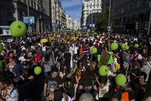 Protesters hold balloons, during a demonstration through the streets of Madrid, commemorating the World Marijuana March. Since 1999, every first Saturday in May the World Marijuana day is celebrated worldwide. Those who participated in the march demanded that marijuana should be legalized and ask that cultivation and possession not be criminalized.