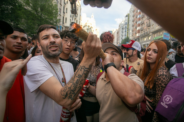 A man smokes a large marijuana cigarette during the World Marijuana March. On the occasion of the celebration of the World Marijuana March, hundreds of people have protested in the center of Madrid against the strict regulations that continue to exist against the cultivation and possession of marijuana. This march has been taking place since 1999 and more than 700 cities around the world participate.