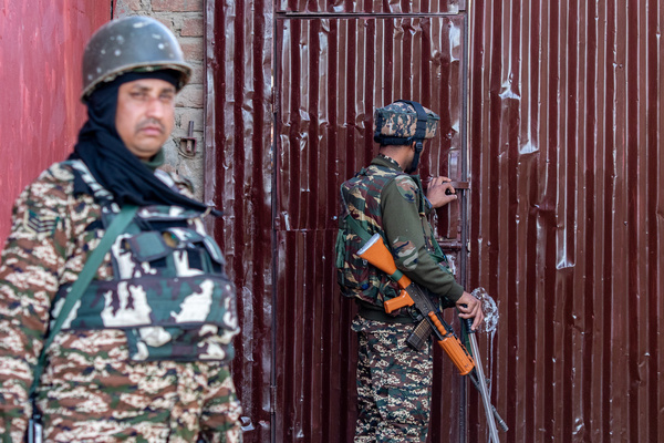 Indian paramilitary troopers stand alert at a polling station during the fourth phase of the Lok Sabha, or lower house, of the Indian parliamentary elections in the outskirts of Srinagar. The 2024 Lok Sabha (lower house of Parliament) parliamentary elections mark the first major election in Jammu and Kashmir since New Delhi revoked Article 370, the region's special semi-autonomous status, in 2019.