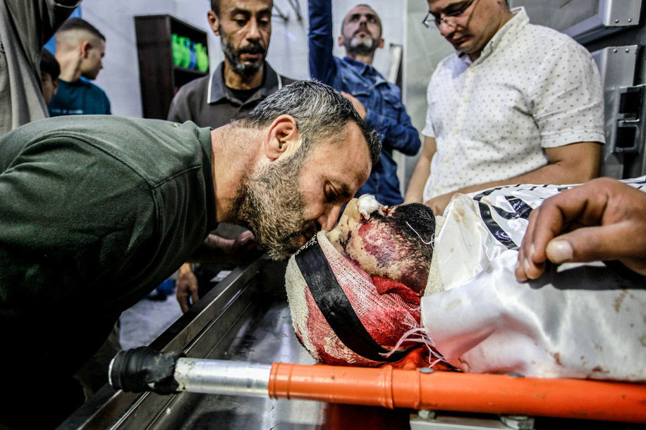 (EDITOR'S NOTE: Image depicts death)
A relative bids farewell to the body of Palestinian Islam Khamisa, killed after an Israeli airstrike in the Jenin refugee camp. The Israeli military says Khamisa, who was killed in an airstrike in the West Bank on Friday, is responsible for two shooting attacks on civilians. One of them in 2023 led to the killing of an Israeli man near a settlement in the West Bank. The armed Islamic Jihad movement said that Al-Khamisa was a commander in the Jenin Brigade. Palestinian health officials reported that eight people were injured in the raid.
