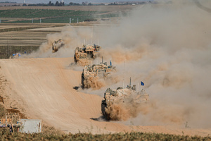 Israeli tanks operate, amid the ongoing conflict between Israel and the Palestinian Islamist group Hamas. The movement of tanks, armored personnel carriers, trucks, and military jeeps belonging to the Israeli army continues along the border near Rafah, Gaza. At least 45 people, mostly women and children, were killed, and nearly 250 others were injured in an Israeli strike on the camp on Sunday.