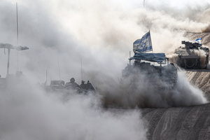 The Israeli tanks with Israeli flags operate, amid the ongoing conflict between Israel and the Palestinian Islamist group Hamas. The movement of tanks, armored personnel carriers, trucks, and military jeeps belonging to the Israeli army continues along the border near Rafah, Gaza. At least 45 people, mostly women and children, were killed, and nearly 250 others were injured in an Israeli strike on the camp on Sunday.