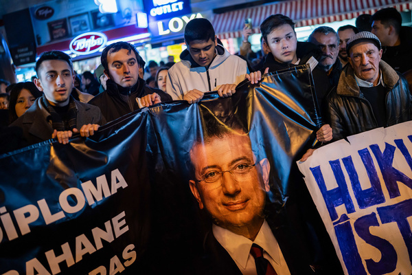 A group of protesters hold a banner that says 'Diploma is an excuse, conspiracy is great' during the demonstration. Ekrem İmamoğlu, the mayor of Istanbul and a leading opposition figure from the Republican People's Party (CHP), was detained by police at his home in Istanbul on charges of aiding the Kurdistan Workers' Party (PKK), which Turkey considers a terrorist organization. His arrest sparked protests across the country, with large gatherings in multiple cities. In Ankara, many CHP supporters assembled in Kızılay Square to denounce his detention. Additionally, Istanbul University recently annulled İmamoğlu’s diploma, effectively disqualifying him from the upcoming presidential elections, as candidates are required to hold a university degree.