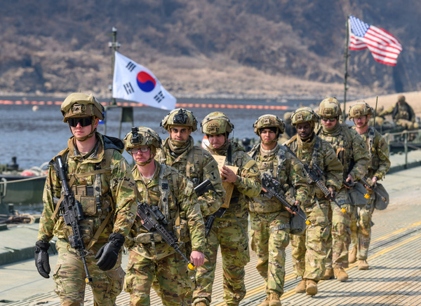 U.S. Army soldiers cross a pontoon bridge on the Imjin River during a joint river-crossing exercise between South Korea and the United States as part of the Freedom Shield military drills in the border town of Yeoncheon.