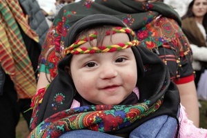 A baby is seen during the Newruz celebration. Tens of thousands gather at the Newroz Square in Diyarbakir, the largest Kurdish-majority city during the final celebration of the Newroz holiday. The massive crowd celebrated with great enthusiasm, marking the occasion with vibrant festivities. This celebration is observed by the Kurdish people in Turkey across 89 locations this year.