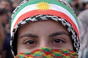 A female demonstrator is seen attending the Newruz celebration with a Kurdish flag tied to her forehead. Tens of thousands gather at the Newroz Square in Diyarbakir, the largest Kurdish-majority city during the final celebration of the Newroz holiday. The massive crowd celebrated with great enthusiasm, marking the occasion with vibrant festivities. This celebration is observed by the Kurdish people in Turkey across 89 locations this year.