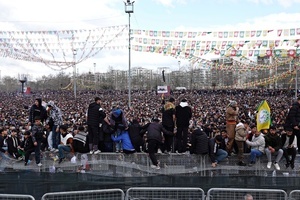 Participants seen during the Newruz celebration. Tens of thousands gather at the Newroz Square in Diyarbakir, the largest Kurdish-majority city during the final celebration of the Newroz holiday. The massive crowd celebrated with great enthusiasm, marking the occasion with vibrant festivities. This celebration is observed by the Kurdish people in Turkey across 89 locations this year.