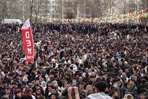 Participants seen during the Newruz celebration. Tens of thousands gather at the Newroz Square in Diyarbakir, the largest Kurdish-majority city during the final celebration of the Newroz holiday. The massive crowd celebrated with great enthusiasm, marking the occasion with vibrant festivities. This celebration is observed by the Kurdish people in Turkey across 89 locations this year.