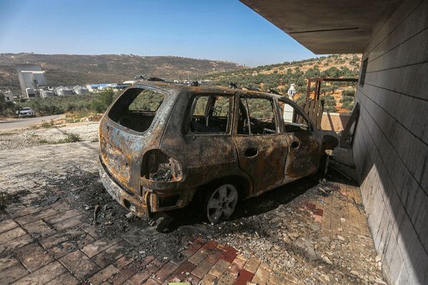 Jewish settlers set fire to a mosque in the village of Aqraba. A Palestinian vehicle burnt after being set ablaze by Israeli settlers in the village of Aqraba, near Nablus in the West Bank. Local residents reported that a group of settlers set fire to the mosque in the middle of the night, and also set fire to a Palestinian car parked nearby. Palestinian residents rushed to extinguish the fire.
