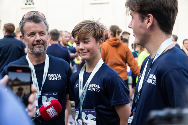 (L-R) King Frederik X, Prince Vincent and Crown Prince Christian speak to the press during the Royal Run. The Royal Run in Copenhagen is part of a nationwide annual event held across several cities in Denmark, first launched in 2018 to celebrate the 50th birthday of then-Crown Prince Frederik (now King Frederik X). Since then, it has become a cherished tradition promoting health, fitness, and community spirit among people of all ages and abilities. Marketed as the world’s largest royal amateur sporting event, the Royal Run also serves as an informal and inclusive way for the Danish Royal Family to connect with the public, drawing 97,500 registered runners this year.