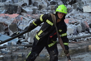 Firefighters work at the site of a Russian drone strike amidst Russia's attack. Russia carried out "massive" drone attacks on Ukraine's capital and port city of Odesa killing one person and hitting a maternity hospital, Ukrainian officials said, and called for further sanctions.