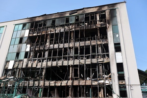 The destroyed and burned facade of a building hit by a Russian drone amidst Russia's attack. Russia carried out "massive" drone attacks on Ukraine's capital and port city of Odesa killing one person and hitting a maternity hospital, Ukrainian officials said, and called for further sanctions.