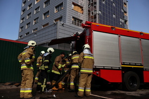 Firefighters work at the site of a Russian drone strike amidst Russia's attack. Russia carried out "massive" drone attacks on Ukraine's capital and port city of Odesa killing one person and hitting a maternity hospital, Ukrainian officials said, and called for further sanctions.