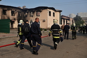 Firefighters work at the site of a Russian drone strike amidst Russia's attack. Russia carried out "massive" drone attacks on Ukraine's capital and port city of Odesa killing one person and hitting a maternity hospital, Ukrainian officials said calling for further sanctions.