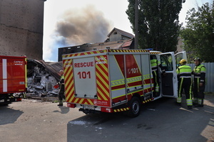 Firefighters work at the site of a Russian drone strike amidst Russia's attack. Russia carried out "massive" drone attacks on Ukraine's capital and port city of Odesa killing one person and hitting a maternity hospital, Ukrainian officials said, and called for further sanctions.
