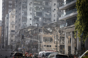 A view of a building that was hit in an Iranian ballistic missile strike. An Iranian missile struck the main hospital in southern Israel early Thursday, causing extensive damage and wounding several people, though none seriously, according to the hospital. Other missiles hit a high-rise apartment building in Ramat Gan, and additional sites in central Israel, leaving at least 240 wounded and four of them seriously according to Israel's Health Ministry.