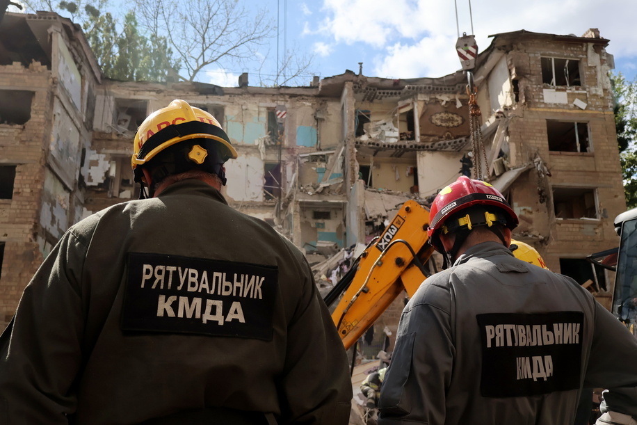 Ukrainian rescuers conduct a search operation in a residential building heavily damaged amid the Russian invasion. Russia has launched its latest missile and drone strike killing at least nine people as Moscow steps up airstrikes on civilian infrastructure.