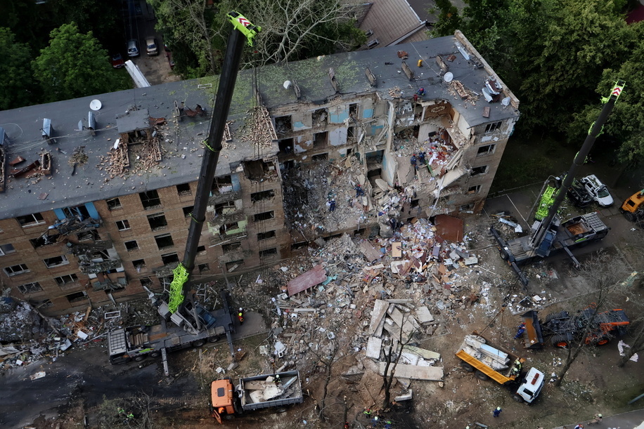 A view of the damaged residential building where a search operation is conducted after shelling during the Russian invasion. Russia has launched its latest missile and drone strike killing at least nine people as Moscow steps up airstrikes on civilian infrastructure.