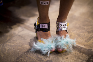 A competitor in heels seen during the High Heel Race on Pelayo Street. The 26th edition of the High Heel Race was held in the LGBTQ+ neighborhood of Chueca, a sporting and festive event that involves running in heels.