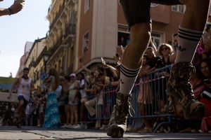 A competitor in heels during the High Heel Race on Pelayo Street. The 26th edition of the High Heel Race was held in the LGBTQ+ neighborhood of Chueca, a sporting and festive event that involves running in heels.