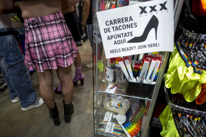 Competitors in heels viewed before running, during the High Heel Race on Pelayo Street. The 26th edition of the High Heel Race was held in the LGBTQ+ neighborhood of Chueca, a sporting and festive event that involves running in heels.