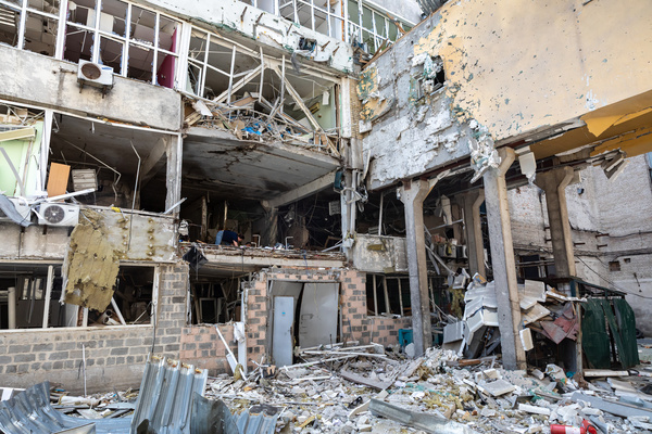 Damaged buildings in Kyiv are seen after an air strike, highlighting the devastation from the ongoing war. Debris and ruins cover the area where life once thrived. On the night of July 4, Russia carried out an unprecedented air attack on Ukraine, deploying over 550 drones and missiles. An air raid alert was declared across the country, but the main strike targeted Kyiv, where significant destruction and casualties were reported. According to Yuriy Ihnat, head of the communications department of the Ukrainian Air Force, this was Russia's most massive air attack since the full-scale invasion began. Among the 550 targets launched, over 330 were Shahed kamikaze drones, setting a new "record" for their quantity in a single attack. Rescue services are actively working in several districts of Kyiv.