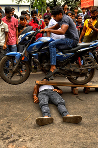 A stunt bike during Ashura, the 10th day of Muharram in the Islamic calendar. Muharram is the first month of the Islamic calendar & Ashura is the tenth day of the month of Muharram, which commemorates the martyrdom of Imam Hussain, the grandson of Prophet Muhammad (PBUH), during the battle of Karbala. It is part of Mourning for Shia Muslims and a day of fasting for Sunni Muslims that is observed all over the World.