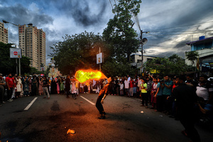 A 'fire breather' performs during Ashura, the 10th day of Muharram in the Islamic calendar. Muharram is the first month of the Islamic calendar & Ashura is the tenth day of the month of Muharram, which commemorates the martyrdom of Imam Hussain, the grandson of Prophet Muhammad (PBUH), during the battle of Karbala. It is part of Mourning for Shia Muslims and a day of fasting for Sunni Muslims that is observed all over the World.