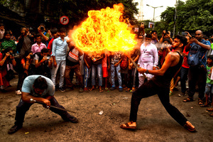 A 'fire breather' performs during Ashura, the 10th day of Muharram in the Islamic calendar. Muharram is the first month of the Islamic calendar & Ashura is the tenth day of the month of Muharram, which commemorates the martyrdom of Imam Hussain, the grandson of Prophet Muhammad (PBUH), during the battle of Karbala. It is part of Mourning for Shia Muslims and a day of fasting for Sunni Muslims that is observed all over the World.