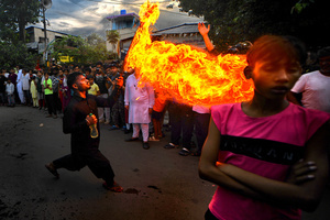 A stunt with fire during Ashura, the 10th day of Muharram in the Islamic calendar. Muharram is the first month of the Islamic calendar & Ashura is the tenth day of the month of Muharram, which commemorates the martyrdom of Imam Hussain, the grandson of Prophet Muhammad (PBUH), during the battle of Karbala. It is part of Mourning for Shia Muslims and a day of fasting for Sunni Muslims that is observed all over the World.