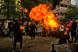 A stunt with fire during Ashura, the 10th day of Muharram in the Islamic calendar. Muharram is the first month of the Islamic calendar & Ashura is the tenth day of the month of Muharram, which commemorates the martyrdom of Imam Hussain, the grandson of Prophet Muhammad (PBUH), during the battle of Karbala. It is part of Mourning for Shia Muslims and a day of fasting for Sunni Muslims that is observed all over the World.