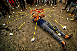 A participant performs with 'Gatka', an ancient form of martial arts, during a religious procession of Ashura, the 10th day of Muharram in the Islamic calendar. Muharram is the first month of the Islamic calendar & Ashura is the tenth day of the month of Muharram, which commemorates the martyrdom of Imam Hussain, the grandson of Prophet Muhammad (PBUH), during the battle of Karbala. It is part of Mourning for Shia Muslims and a day of fasting for Sunni Muslims that is observed all over the World.
